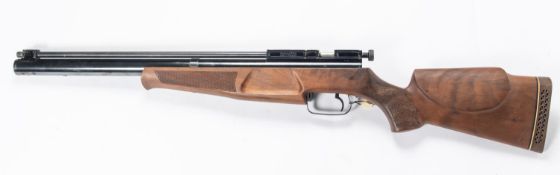 A .22" Parker Hale Dragon side lever air rifle, number 0154, with walnut stock, pistol grip, cheek