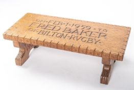 A presentation carved wood stool, inscribed to Fred Baker of Bilton Rugby, served on Gallipoli