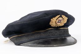 A Third Reich Veterans Association peaked cap, marked inside "Helvetia Ges Gesch", pressed metal