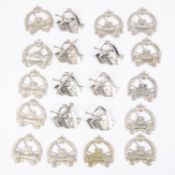 20 scarce Iraqi tank crew badges, from one of the Saddam Hussein wars, diestruck white metal.