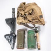A Third Reich Mountain Troops rucksack, 2 respirator canisters; 2 post war black leather Luger