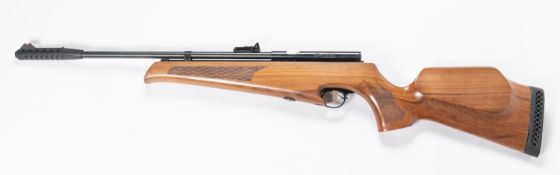 A .22" SMK XS78CO2 air rifle, no visible number, with pale walnut stock and rubber heel. GWO & C.