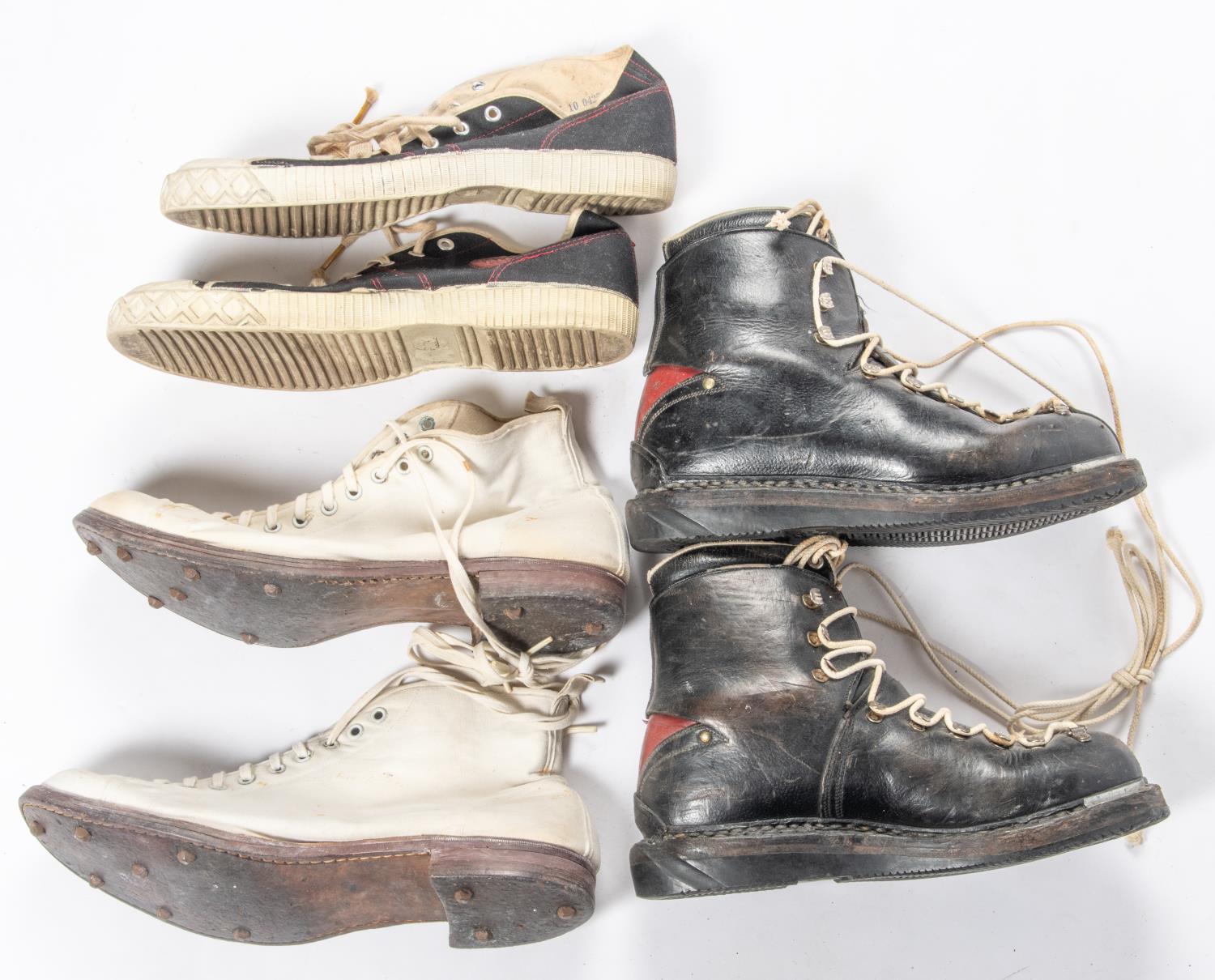 A pair of vintage ski boots; a pair of white canvas cricket boots and a pair of Elcho tennis