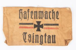 An Imperial German armband: Hafenwache Tsingtau, stamped 1913. GC £65-70