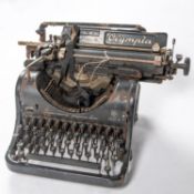 A large Third Reich period typewriter, marked "Olympa Buromasi Neu Werke A.G. Erfurt" needs