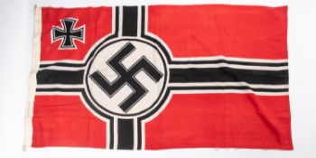 A Third Reich Reichskriegsflagge, 32" x 53", the hoist stamped with eagle and swastika etc, GC (a