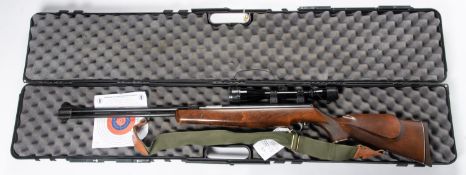 A .22" Weihrauch HW77 underlever air rifle, number 1048818, retailed by Hull Cartridge, with Nikko