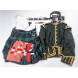 A Highland piper's uniform, comprising full size dirk, dress imitation skean dhu, gilt laced green