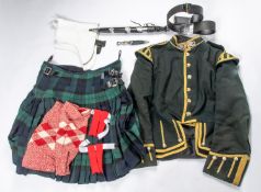 A Highland piper's uniform, comprising full size dirk, dress imitation skean dhu, gilt laced green