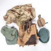 A good Third Reich ponyskin pack, dated 1940 together with a camouflage zeltbahn, bread bag, water