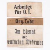 A Third Reich "Double Decker" armband: khaki "Org Todt." over white "Im Dienst Der Deutschen