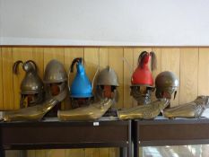 Re-enactment ancient Greek or Persian fibreglass armour, comprising 5 helmets and 2 pairs of leg