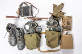 2 light pattern respirators in their WWII bags; a pair of ammunition boots; a St John Ambulance