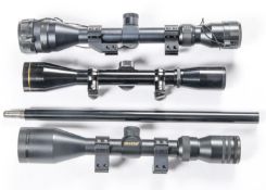 Three telescopic rifle sights: Simmons Model M1050 DM Diamond 3.8-12x44; Tasco 1.75-5x40, with