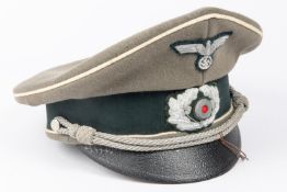 A Third Reich Army officers SD cap, alloy bullion insignia and cords, generally GC (peak patent