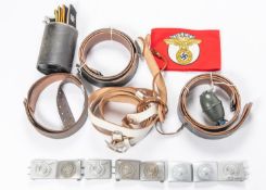3 post war German leather waistbelts; 8 replica buckles; an NSKK arm band; a grenade and several
