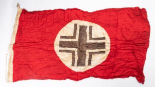 A Third Reich printed flag, 60" x 32", central panel has runic symbol, edge dated 1943. GC £65-70