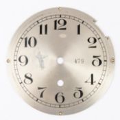 A Third Reich silvered clock dial, 6½" diameter, has originally had eagle and swastika over M, but