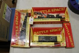 4 Tri-ang Hornby Battle Space series items. A Catapult Plane Launching Car (R.562K). A Multiple