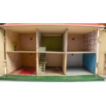 A 1960s Tri-ang No.65 Doll's House. Together with a quantity of 1960s furniture and a small quantity