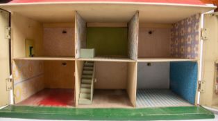 A 1960s Tri-ang No.65 Doll's House. Together with a quantity of 1960s furniture and a small quantity