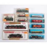 11 N gauge model railway rolling stock. 6x Fleischmann: 2x DB steam locomotives, 2-10-0 tender