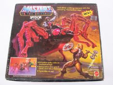 A Mattel Masters of the Universe Spydor Evil Stalker (dated 1984). Boxed with instructions and inner