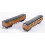 2x A Hornby Series O gauge Metropolitan Railway bogie coaches in teak livery with brass buffers. A