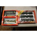 3x Hornby Railways OO gauge BR DMU packs. A 3-car Diesel Multiple Unit in dark green lined livery