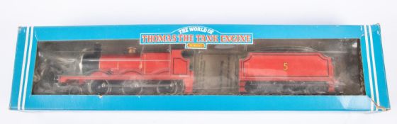 Hornby OO gauge Thomas the Tank Engine, James 2-6-0 locomotive (R852). 5, in lined red livery.