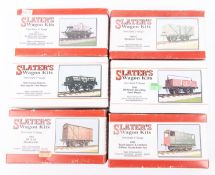 6x O gauge Slater's freight wagons. Including; 2x open wagons, 2x tank wagons, a box van and a