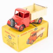 Dinky Toys Bedford End Tipper (410). Red chassis cab with cream body and red wheels. Boxed, some
