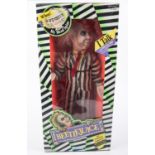 A Kenner Beetlejuice talking figure (dated 1989). Large scale doll with pull-string action. Boxed