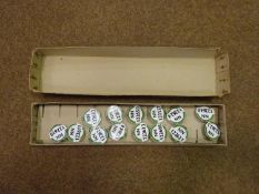 An original trade card box of London Transport PSV bus conductor's badges. Made by Formica Ltd and