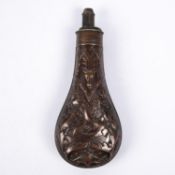 A gun size embossed copper powder flask “oak leaf and stag’s head” (R 574), 8” overall, with patent