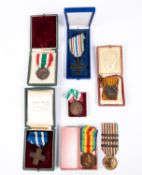 Seven Italian war medals, including 1914-18 Victory medal, Merito di Guerra cross, 1915-18 war medal