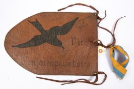 A very interesting Vichy French brown leather pennant, applied leather bird motif, hand written "