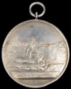 "Wickham Bishops Rifle club silver shooting medal, obverse 2 military personnel prone firing at a