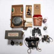 A WWII type P4A compass, in its fitted case, 2 pairs of binoculars; a microscope: students No 3/A;
