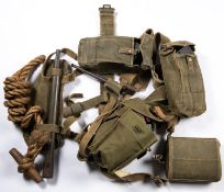A set of WWII infantrymans 1937 webbing, comprising waistbelt, cross straps, ammunition pouches with