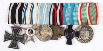 A group of six WW1 German medals: 1914 Iron Cross 2nd Class, Order of Merit with swords, Bavarian