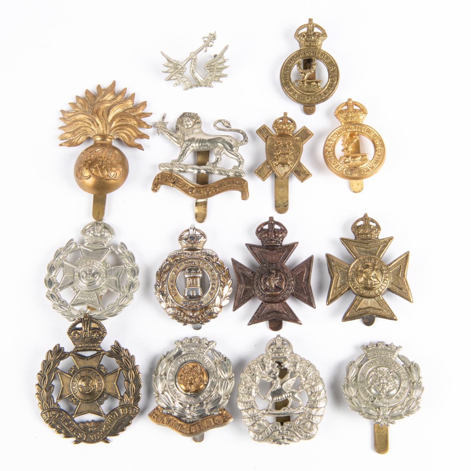 14 Territorial Battalion and Regiment cap badges: 8th Bn W Yorkshire Regt, 6th Bn Hampshire and