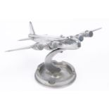 A cast aluminium desk ornament/ashtray, in the form of a WWII Short Stirling four engined bomber,