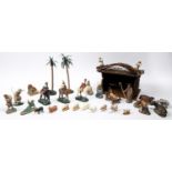 A Nativity Set. 1930s/40s Spanish 25 piece Nativity set in painted clay/composite material.