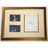 Framed signature of Eric Clapton on Concorde Menu, together with 2x photographs. A Framed