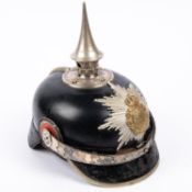 An Imperial German Saxony officials pickelhaube, with star plate and white metal mounts, including