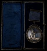 Forfar Volunteer Rifles medal, obverse a kneeling rifleman right, reverse engraved inscription "