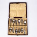 A box of 6 HM silver rifle club prize spoons, by Elkington & Co, the handle finial with crossed