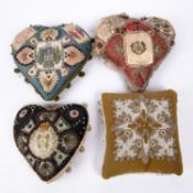 Three early 20th century heart shaped sweetheart pin cushions, incorporating the badge of the