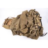 A WWII British Army Bergen rucksack, dated 1941, complete with all webbing straps and in good